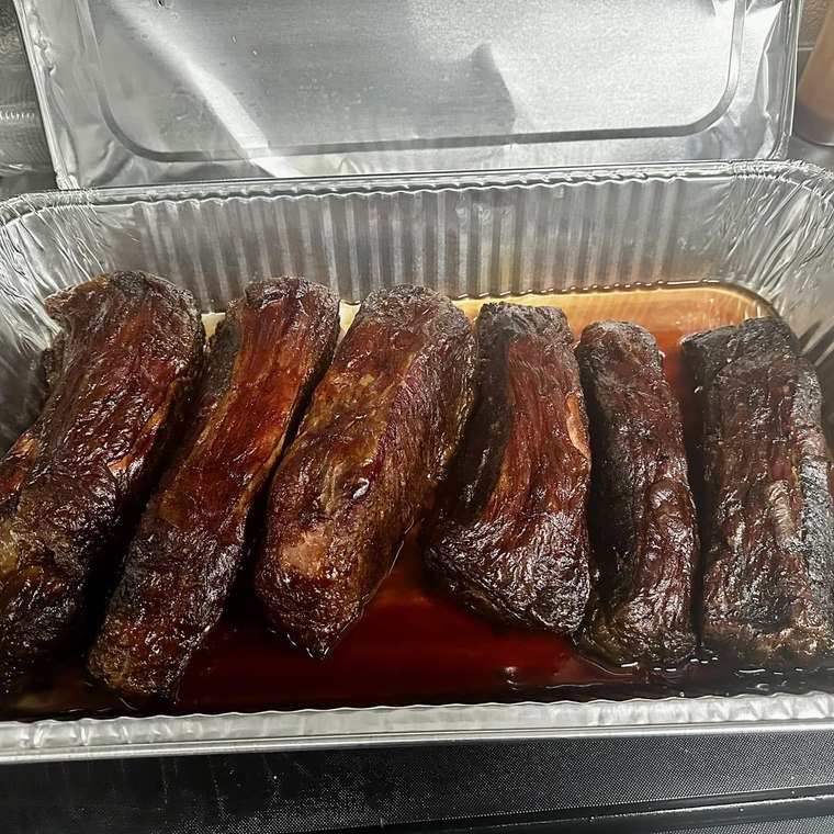 A tray of smoked brisket and burnt ends, straight off the smoker