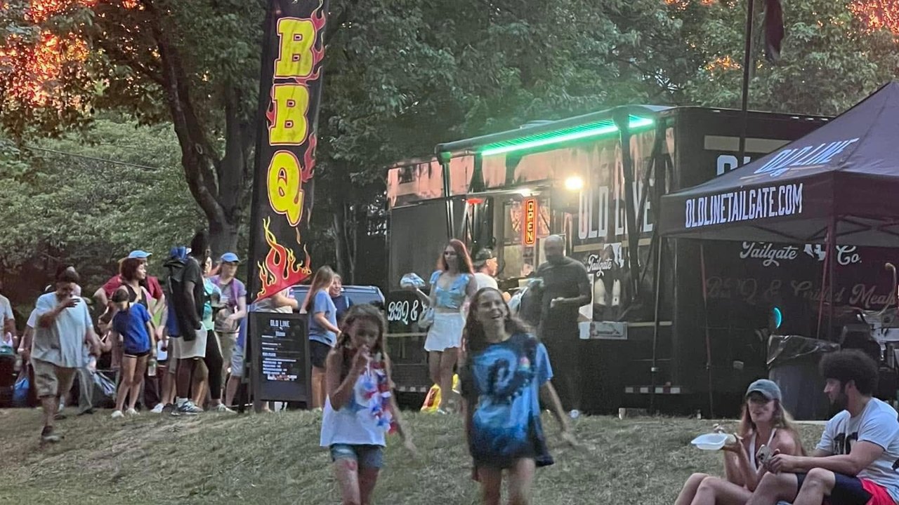 The Old Line Tailgate Co. food truck at dusk