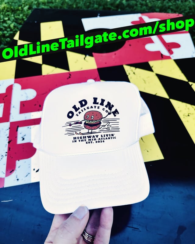 An Old Line trucker hat on a Maryland flag