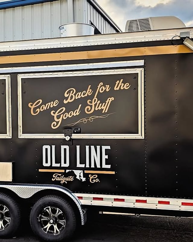 The side of the Old Line trailer, lettered Come Back for the Good Stuff