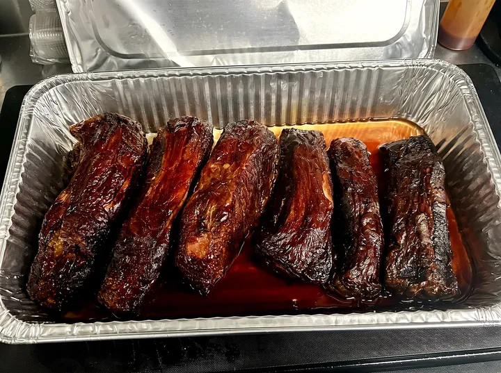 A tray of smoked brisket and burnt ends